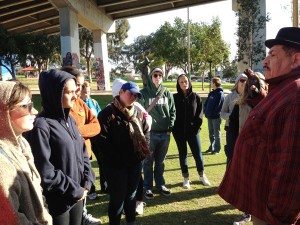 Chicano Park muralist Victor Ochoa engages Loyola students.