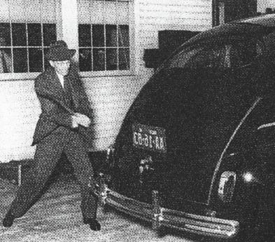 Henry Ford demonstrates the strength of his car "grown" from a combination of hemp and other annual crops, and designed to run on hemp fuel, by smashing it with a crowbar. (Popular Mechanics, 1941)