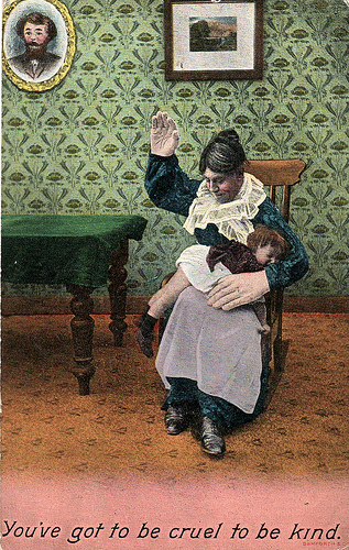 Woman spanking child